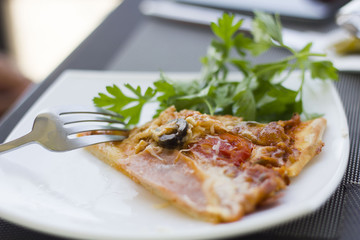 Delicious pizza on table in cafe