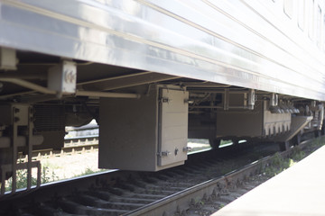 Old steam locomotive engine wheel and rods details. train on the railroad tracks