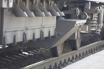 Old steam locomotive engine wheel and rods details. train on the railroad tracks