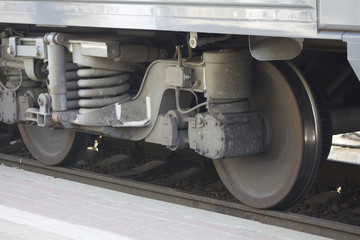 Old steam locomotive engine wheel and rods details. train on the railroad tracks