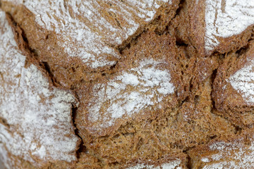 Macro photo of the surface of brown bread