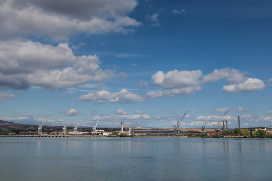 Cranes from the Drobeta Turnu Severin (Romania) shipyard taken from the other side of the Danube. Almost abandoned now, the shipyard used to be one of the biggest of Romania.
