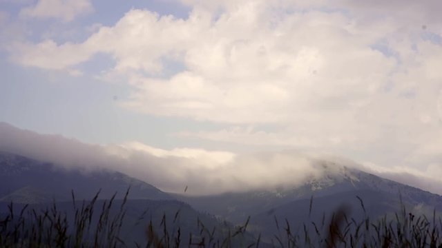 An accelerated movement of clouds over the mountains. Ukraine. Carpathians 2017year Summer day in the mountains. timelipse.