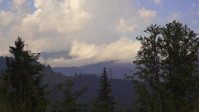 An accelerated movement of clouds over the mountains. Ukraine. Carpathians 2017year Summer day in the mountains. timelipse.