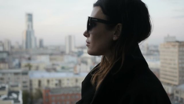 Pretty woman admiring cityscape