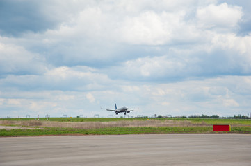 Plane lands in the airport runway