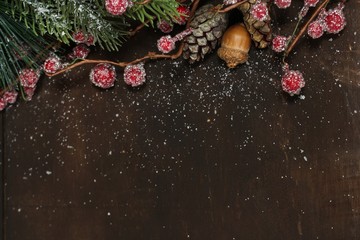 Obraz na płótnie Canvas Holiday background with copy space- dark wood with christmas theme