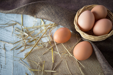 Eggs in a basket for cooking.