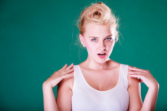 Angry young woman with pin up hair