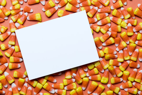 Halloween candy corn sweet background with blank sign
