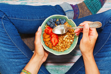 Having breakfast sitting on the floor