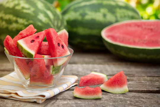 Sliced watermelon in clear glass bowl