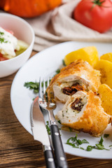Chicken breast stuffed with cheese and dried tomatoes.