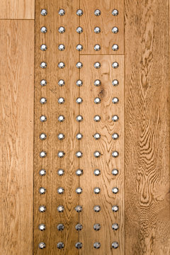 brown pine wood wall and silver chrome buttom/rivets roll, Background and texture