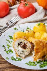Chicken breast stuffed with cheese and dried tomatoes.