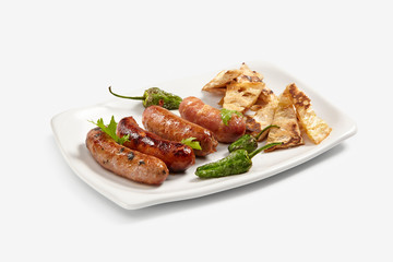 sausages with vegetables green peppers and mushrooms