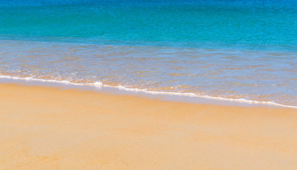 Fototapeta na wymiar Beautiful tropical beach with sea view, clean water and blue sky