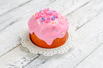 Traditional Easter bread or cake on wooden table