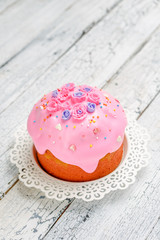 Traditional Easter bread or cake on wooden table