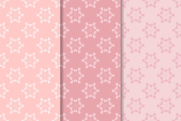 Set of floral ornaments. Pale pink vertical seamless patterns