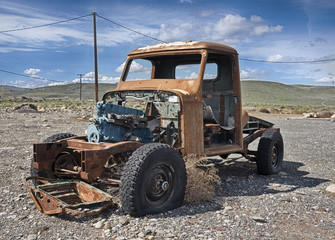 Rusting Pickup Truck In Parking Lot