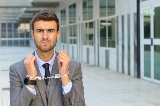 Tied up businessman in office space