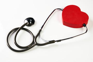 Medical stethoscope and red heart