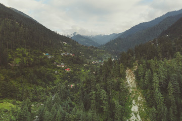 Himachal Pradesh village scattered across the mountain.