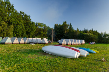 Sumer's tent camp with canoe, Slezska Harta, Czech Republic