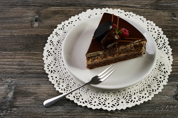 Slice of chocolate cake with chocolate cream