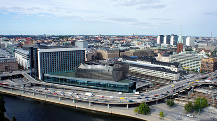Aerial view of road with car traffic and cityscape from the observation deck of Town Hall, Stockholm, Sweden