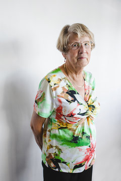 Smiling Senior Woman On White Background