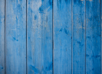 Naklejka premium wooden fence background with a blue color