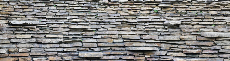 Panorama stone wall background and texture image