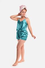 Female model dressed in blue pajamas