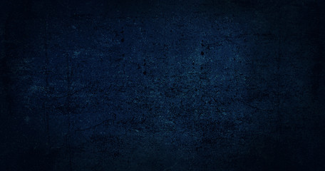 Blue dark background of school blackboard colored texture. Blue black vignetted aged texture background. Long format