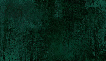 Dark green background of school blackboard colored vignetted texture. Dark green black shabby texture.