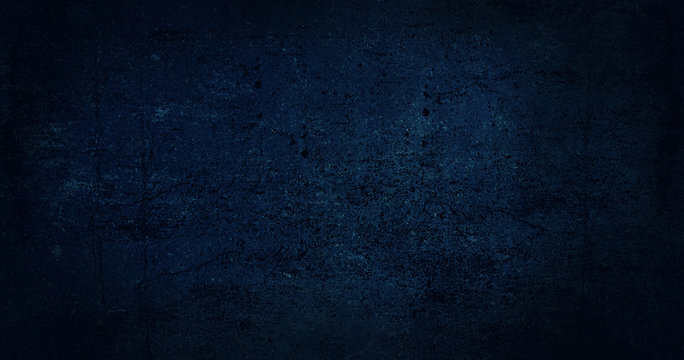 Blue dark background of school blackboard colored texture. Blue black vignetted aged texture background. Long format
