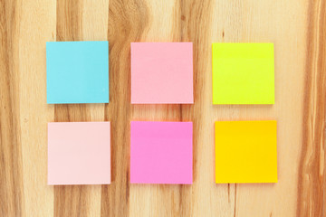 Blank sticky paper note on wall