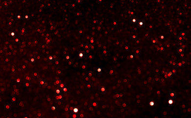 Fototapeta na wymiar bokeh Red festive Christmas abstract background or with blank space