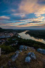 View of a small town along the Danube river after sunset, Hainburg der donau, Austria, Europe