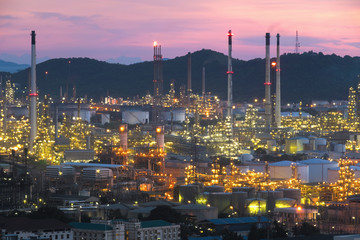 Oil refinery at sunset. Industry