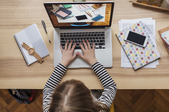 Girl Using a Laptop Computer