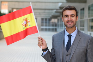 Proud man waving the Spanish flag