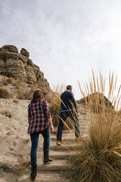Mid Adult Couple in a Desertic Landscape