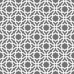 Islamic seamless vector pattern. White Geometric ornaments based on traditional arabic art. Oriental muslim mosaic. Turkish, Arabian, Moroccan design on a dark background. Mosque decoration element
