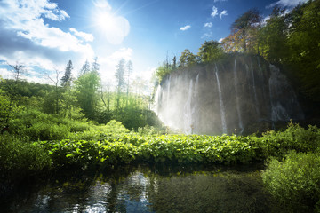 waterfall in forest, Plitvice Lakes, Croatia © Iakov Kalinin