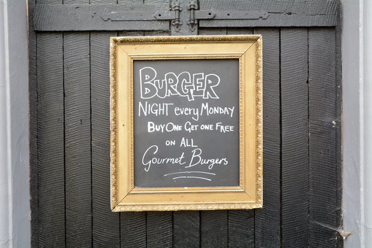 Burger Night every Monday - Buy One get One Free on all Gourmet Burgers sign outside public house