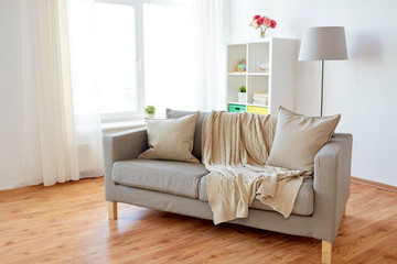 sofa with cushions at cozy home living room