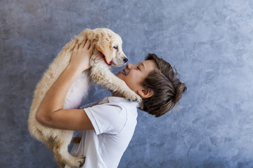 Teen boy with golden retriever © BGStock72